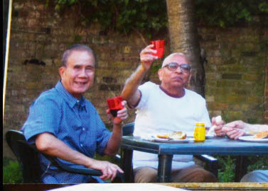 Our Thin Red Line campaign leads to fire safety inquiry Choi Yip with neighbour Karl Kosmo