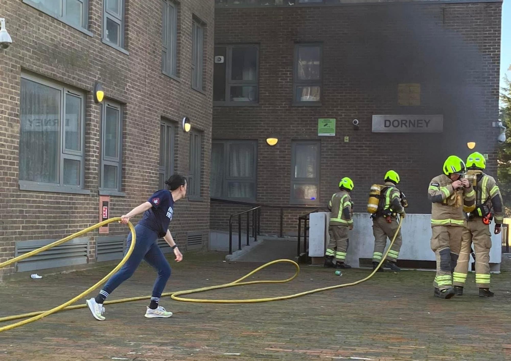 Stairwell fire alert at tower block on evacuation estate dorney fire LOVE CAMEN